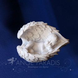 FIGURINE BEBE ENDORMI DANS PLUME